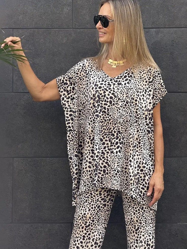 top mujer cuello pico ancho