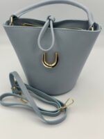 bolso-de-mujer-de-piel-azul-nudo-asa-lopezientos.jpeg