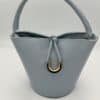 bolso-de-mujer-de-piel-azul-nudo-lopezientos.jpeg
