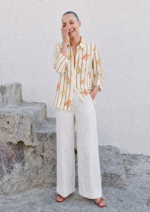 camisa-mujer-basica-cuella-camisa-beige-estampada-zahara-parole-italy-lopezientos.png