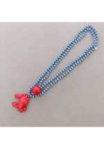 collar-largo-cuentas-cristales-facetados-colgante-cangrejo-metal-azul.jpg