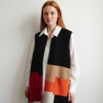 chaleco-de-mujer-intarsia-bolsillos-negro-lopezientos.jpg
