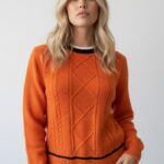 jersey-de-mujer-trenzas-cuello-contraste.jpg